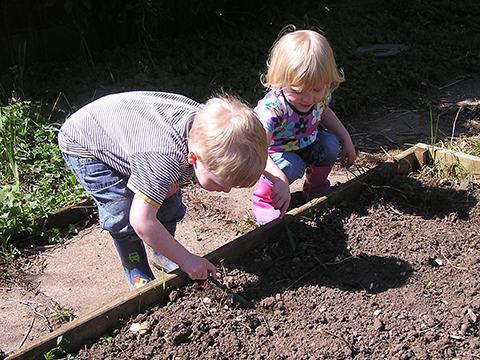 playing in the soil one of the best sensory play ideas for plants and seeds